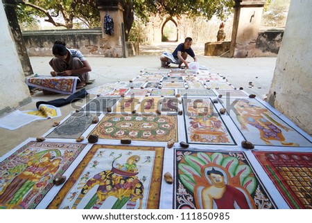 BAGAN, MYANMAR - FEB 15: Sand paintings for sale on Feb 15, 2011 in Bagan, Myanmar. Sand paintings are popular because they are made using sand-covered cloth as a medium rather than ordinary canvas