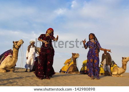 JAISALMER, INDIA-FEB 26: Cultural dance at Sam Sand Dune on Feb 26, 2013 in Jaisalmer, India.The event is part of the Desert Festival held in winter to attract both domestic and international tourists
