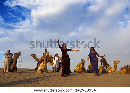 JAISALMER, INDIA-FEB 26: Cultural dance at Sam Sand Dune on Feb 26, 2013 in Jaisalmer, India.The event is part of the Desert Festival held in winter to attract both domestic and international tourists