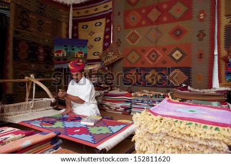 Jodhpur, India - Feb 28: A Craftsman Uses A Handloom To Produce Rugs On Feb 28, 2013 In Jodhpur, India. The Handloom Sector Is Known For Its Heritage And Tradition Of Excellent Craftsmanship Of India.