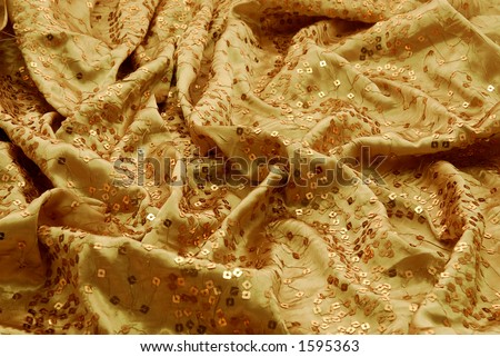 Gold fancy dress fabric to make a special occasion dress