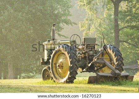 A vintage tractor in morning for