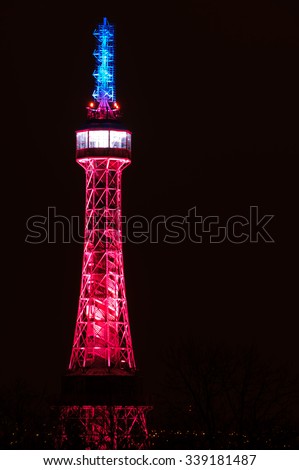 PRAGUE, CZECH REPUBLIC - NOVEMBER 14, 2015: The Petrin Lookout Tower in Prague lit up with the Tricolor in a show of support for the people of France following the deadly terrorist attacks in Paris.