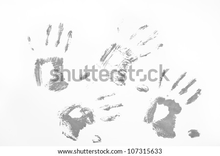 Four grey handprints against a white background