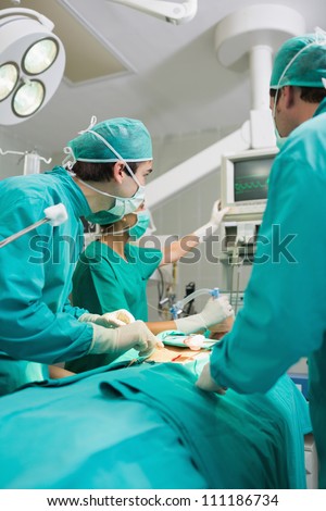 Surgeon looking at a monitor in an operating theater