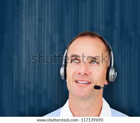 Businessman wearing head set against blue background