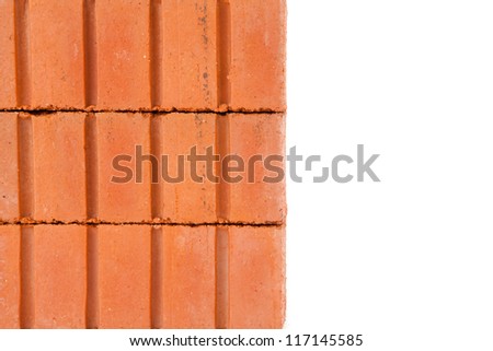 Stacked clay red bricks