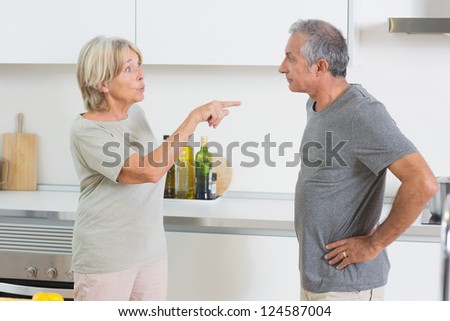 Couples dispute in the kitchen