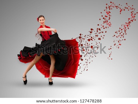 Smiling flamenco dancer with heart shaped paint splatter coming from dress on grey background