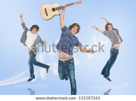 Three of the same teenage boy jumping for joy one holding a guitar with white smoke trails on blue background