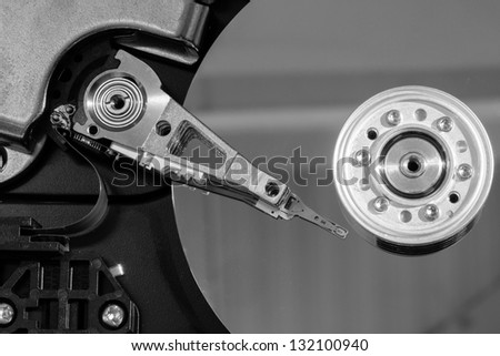 Close up of a spindle of disk drive in black and white