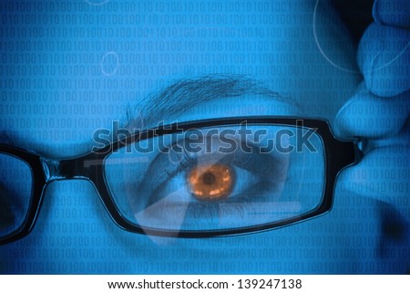 Woman with orange eye wearing glasses with binary code overlay