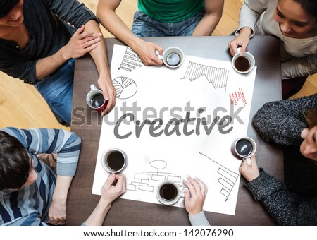 Creative Written On A Poster With Drawings Of Charts During A Brainstorm