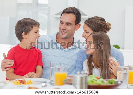 Happy family during the dinner at home at the table