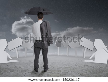 Businessman holding umbrella and jacket and thinking about his future
