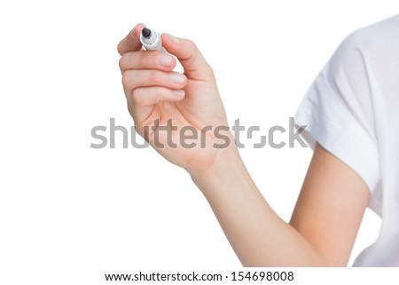 Female hand holding black whiteboard marker on white background