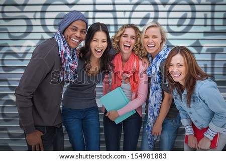 Happy Group Of Friends Laughing Together On Graffiti Background