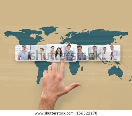 Hand selecting futuristic interface showing business people