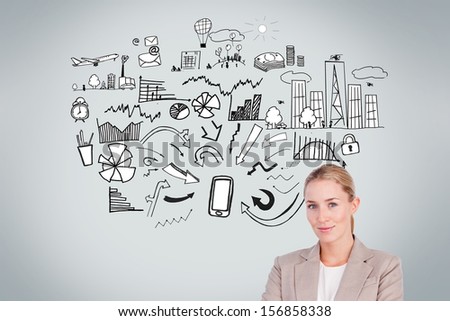 Composite image of confident female executive smiling at camera in front of economic illustrations on grey background