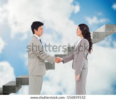 Composite image of hand shaking trading partners in front of stairs floating in sky