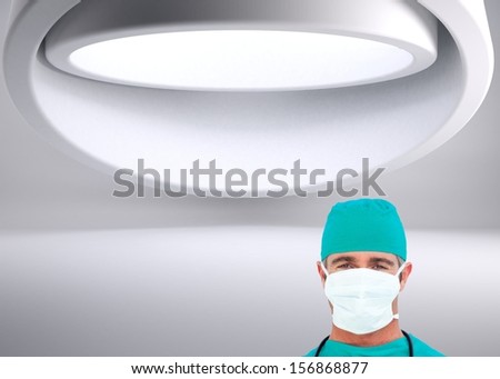 Composite image of portrait of an ambitious surgeon standing in white room with huge light above head