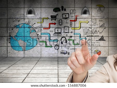 Composite image of Woman\'s hand pointing against wall background showing global business development