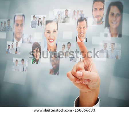 Close up of a man selecting a profile picture on digital screen