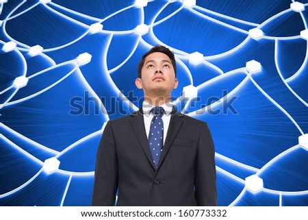 Composite image of glowing dots connected with lines on blue background