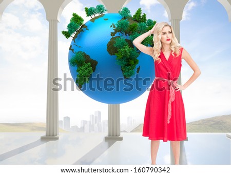 Composite image of elegant blonde standing hand on hip in red dress