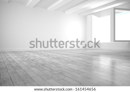 White room with windows and floorboards