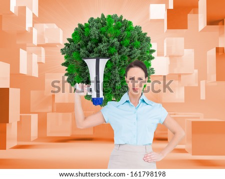 Composite image of stern classy businesswoman holding megaphone while posing on white background