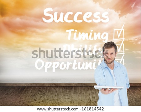 Composite image of happy man showing laptop to camera and smiling on white background
