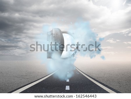 Open safe in dust cloud over street