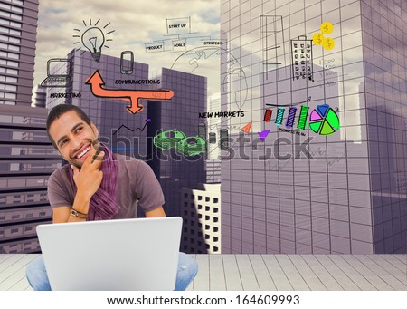 Composite image of thinking man sitting on floor using laptop and smiling