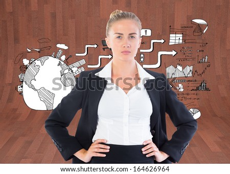 Composite image of blonde businesswoman standing with hands on hips