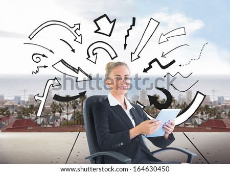Composite image of blonde businesswoman sitting on swivel chair with tablet