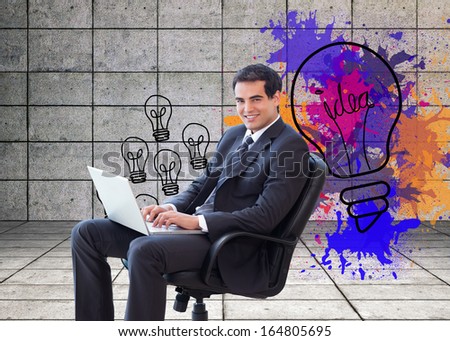 Composite image of portrait of a young businessman sitting on an armchair working with a laptop