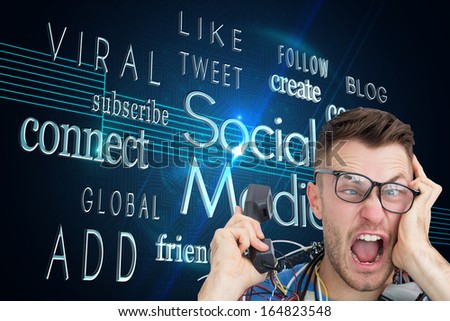 Composite image of portrait of frustrated computer engineer screaming while on call in front of open cpu