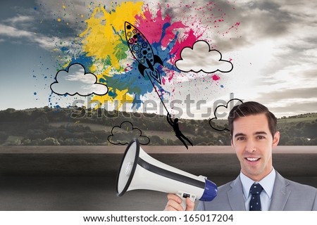 Composite image of smiling businessman holding a megaphone
