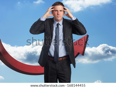 Stressed businessman with hands on head against airplane flying past window
