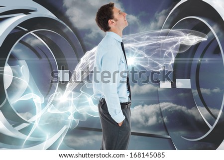 Happy businessman standing with hand in pocket against cloud and energy design on a futuristic structure
