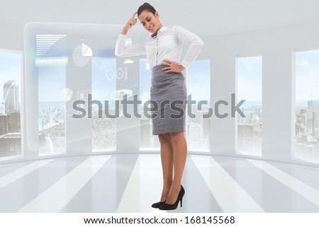 Smiling thoughtful businesswoman against server hallway seen through window