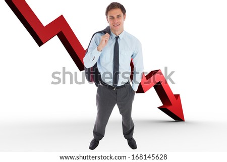Smiling businessman holding his jacket against red arrow pointing down