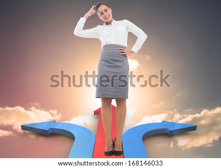 Smiling thoughtful businesswoman against red and blue curved arrows pointing against sky