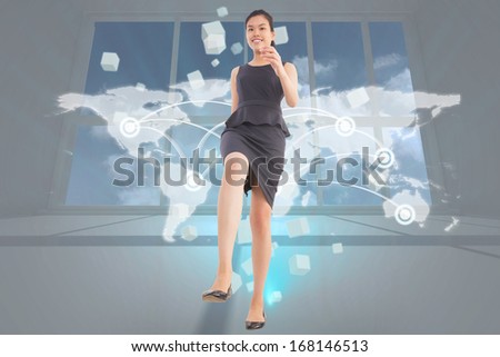 Businesswoman stepping up against gloomy sky seen through window