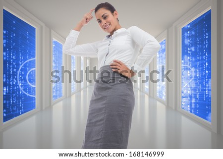 Smiling thoughtful businesswoman against glowing key seen through windows