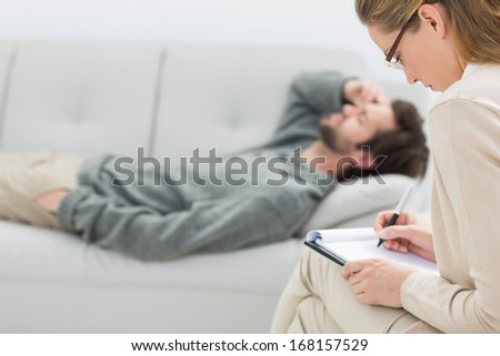 Young man in meeting with a financial adviser at home