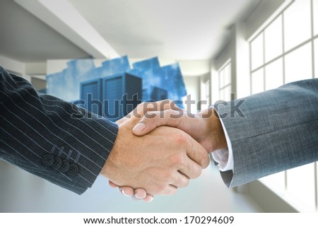 Composite image of business handshake against futuristic shiny arrow