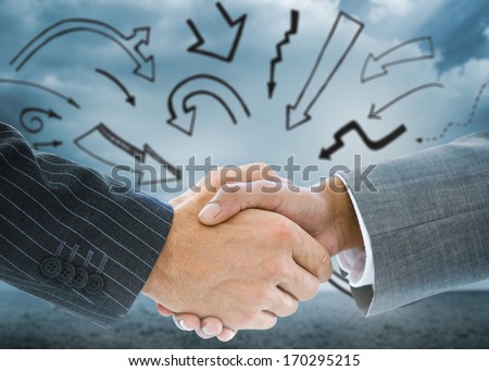 Composite image of business handshake against glowing world map on black background