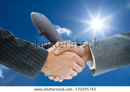 Composite image of business handshake against 3d plane flying in the sky
